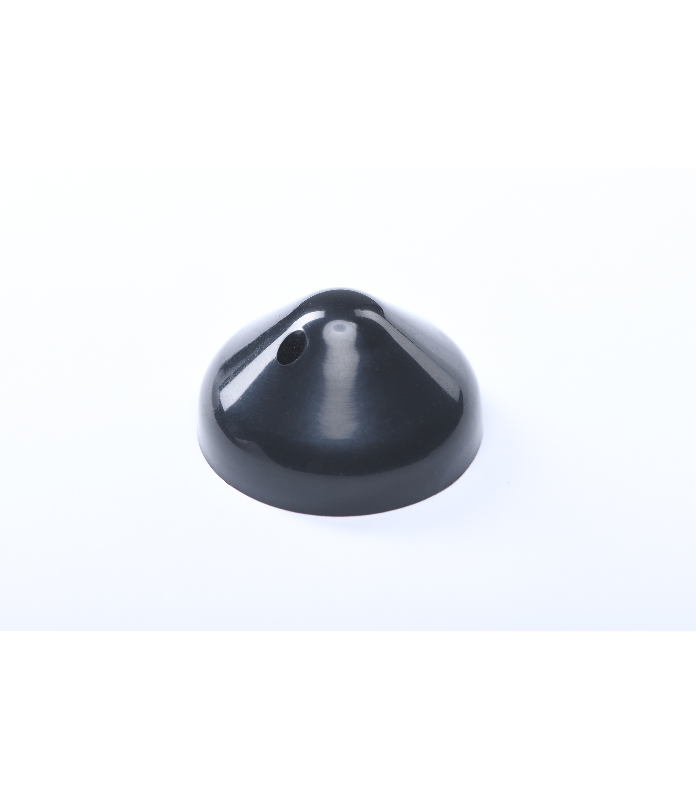 Photographie d'un badge antivol bouton sans son clou