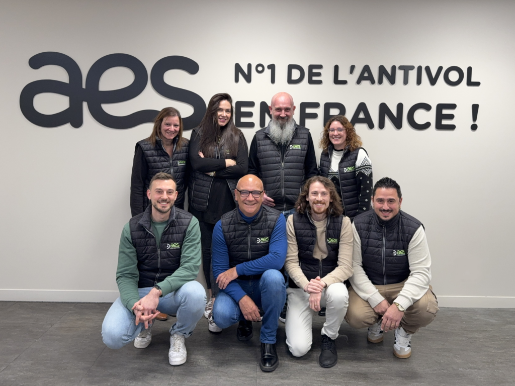 Photo de groupe de l'équipe AES Protection (8 personnes)